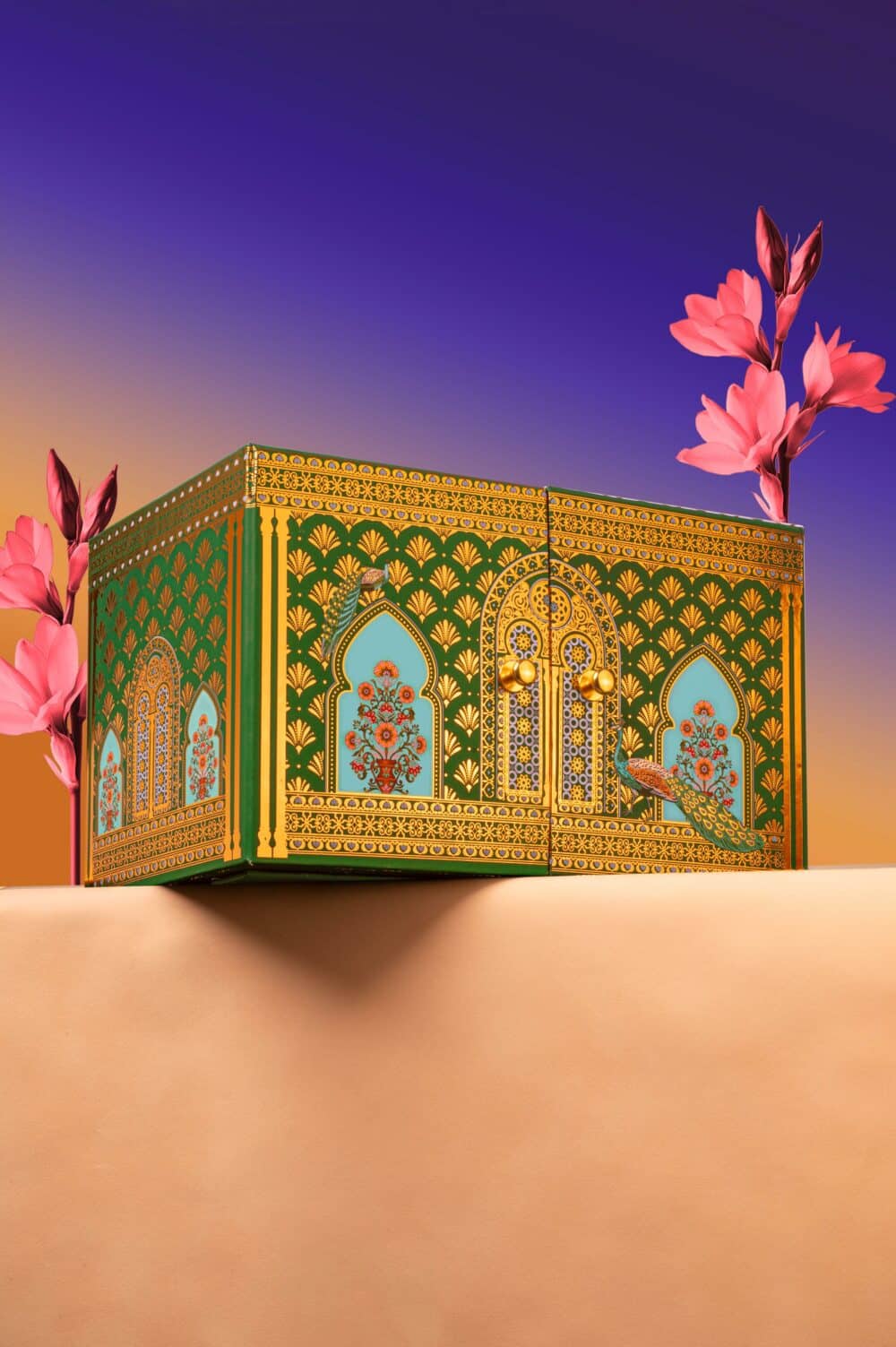 luxury Eid cabinet box with chocolates and cookies green and gold Forrey & Galland Eid gift box open with layers