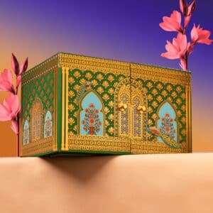 luxury Eid cabinet box with chocolates and cookies green and gold Forrey & Galland Eid gift box open with layers