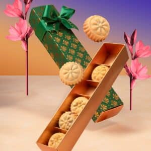 Luxury Eid mamoul box Forrey & Galland Green and gold Eid gift box with fig and pistachio mamoul