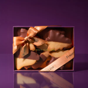 Forrey & Galland half-dipped vanilla sablé cookies in festive gift packaging