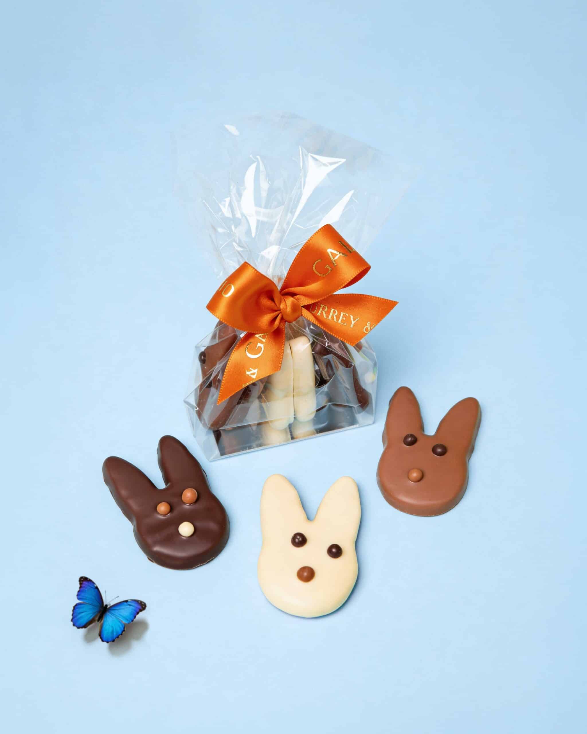 Handmade Easter sable rabbit biscuits coated in milk dark and white chocolate