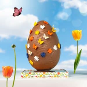 Handcrafted Easter butterfly chocolate egg with floral details and treats inside