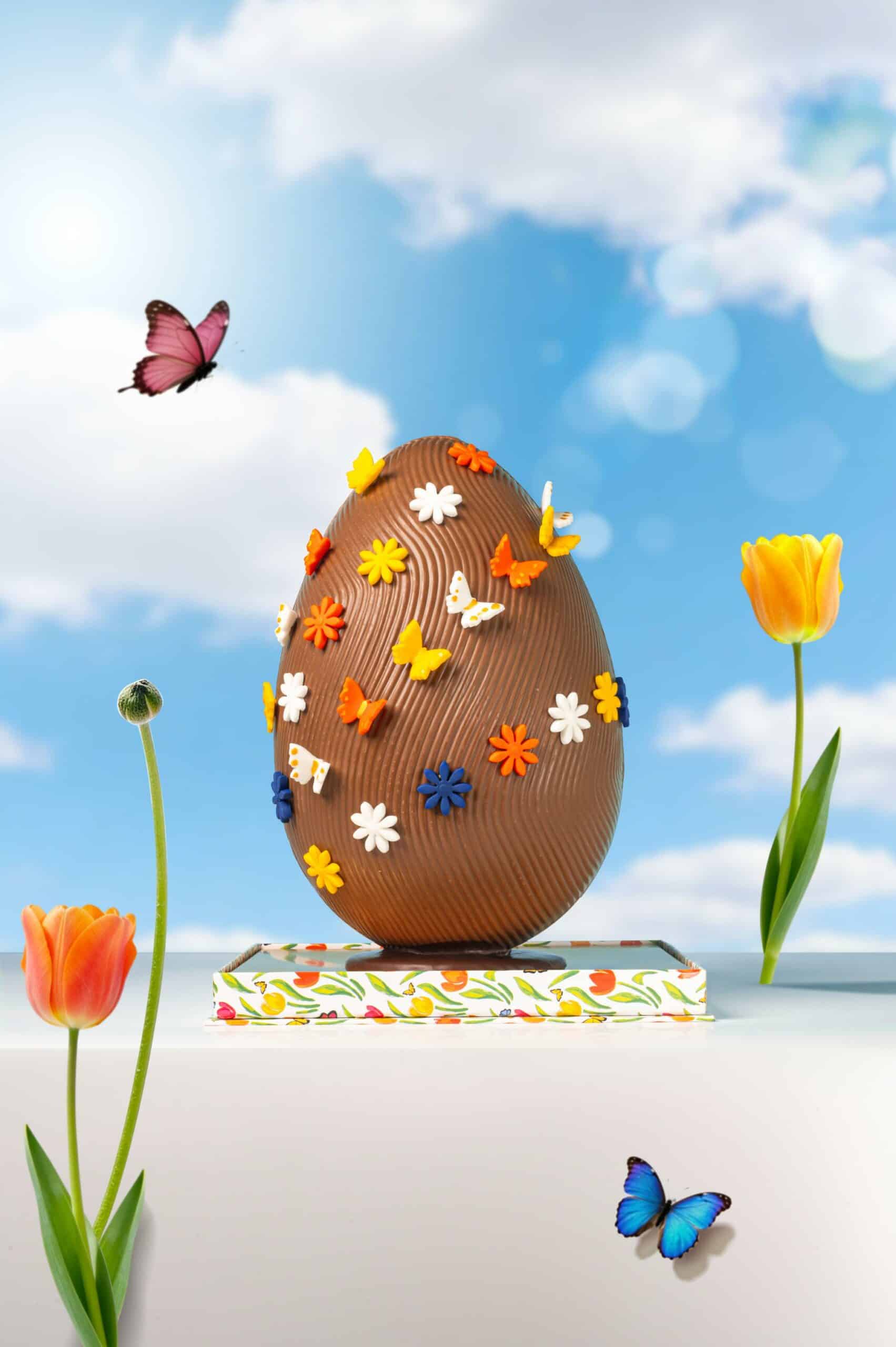Handcrafted Easter butterfly chocolate egg with floral details and treats inside